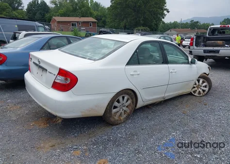 2004 Toyota Camry Xle z USA, uszkodzony, nr VIN 4T1BE30K44U377647
